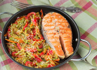 Salmon steak with vegetables