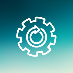 Gear wheel with arrow thin line icon