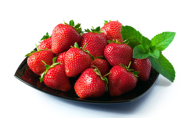 Ripe fresh strawberries on plate