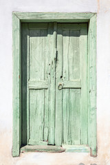 old green door on Santorini in Greece