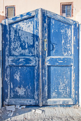 old blue door on Santorini in Greece