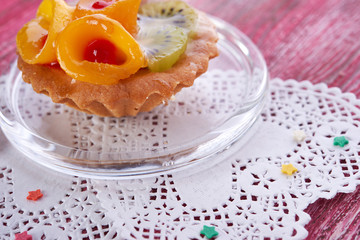 sweet cake with fruits on plate