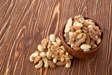 Mix nuts  on wooden background