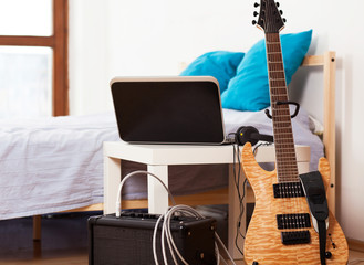 Guitar with an amplifier at home