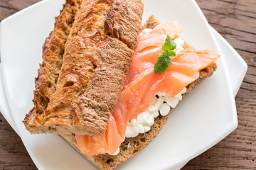 Sandwich with salmon and cheese