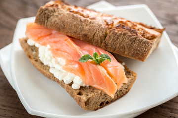 Sandwich with salmon and cheese