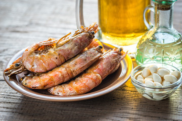 Fried shrimps with glass of beer