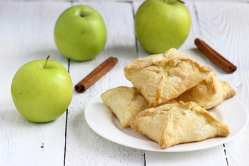 Tasty puff pastry with apple  on plate