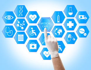 Medical doctor working with healthcare icons. Modern medical technologies concept