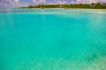 Fototapeta na wymiar Idyllic perfect turquoise water at exotic island