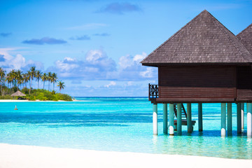 Water bungalows with turquiose water on Maldives