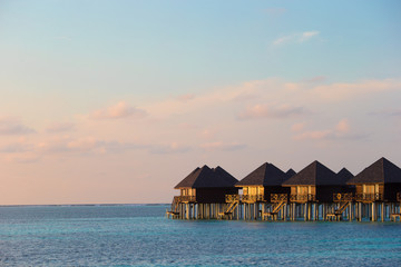 Water villas, bungalows on ideal perfect tropical island