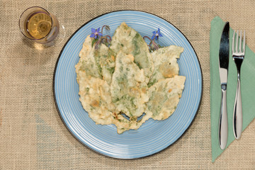 Borage leaves fried in batter, traditional Italian cuisine