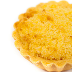 Lemon Coconut Tartlets on white background. Shallow dof