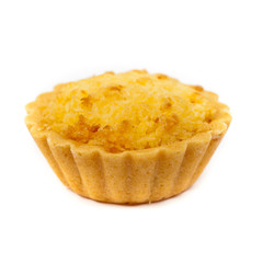 Lemon Coconut Tartlets on white background. Shallow dof