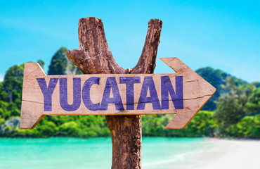 Yucatan wooden sign with beach background