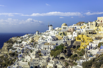 Village of Oia with white cave homes on Santorini Island, Greece