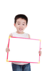 The little boy holding a blank billboard