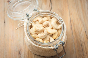 raw unsalted cashews in glass jar