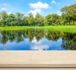 Empty table over blur park background