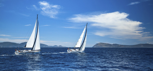 Sailing in the wind through the waves at the Aegean Sea.