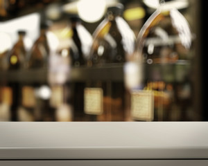 Empty table and blurred vintage bottle with bokeh background, pr