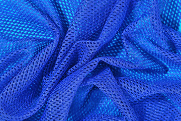 Blue crumpled nonwoven fabric background