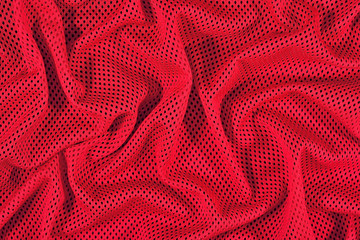 Red crumpled nonwoven fabric background