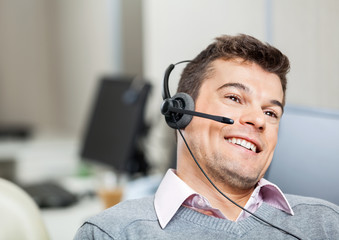 Smiling Customer Service Representative Wearing Headset