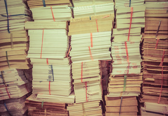stack of old books and documents in retro color