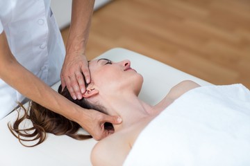 Obraz na płótnie Canvas Physiotherapist doing neck massage