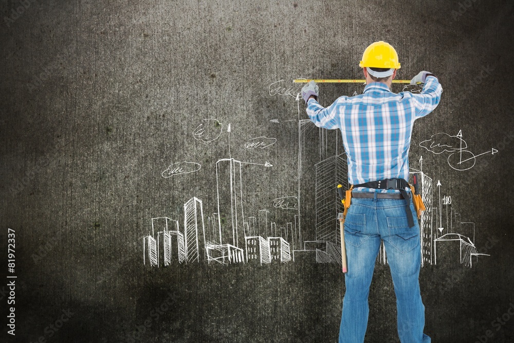 Poster construction worker using measure tape