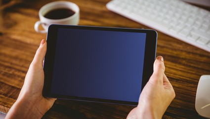 Woman using her tablet pc