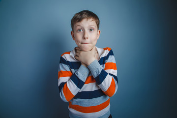teenager boy of about ten European appearance brown hair holding