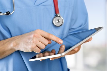 Healthcare And Medicine. Doctor holding digital tablet
