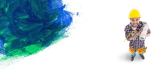 Composite image of frustrated handyman holding various tools