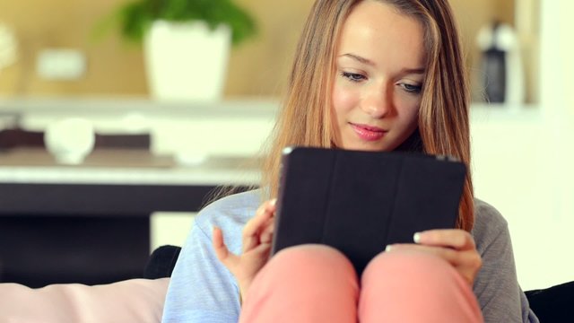 Teenage Girl using Tablet