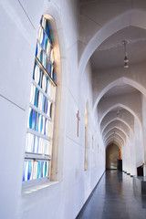Stained Glass and Crosses Under Arches