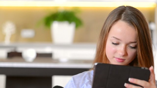 Teenage Girl using Tablet PC