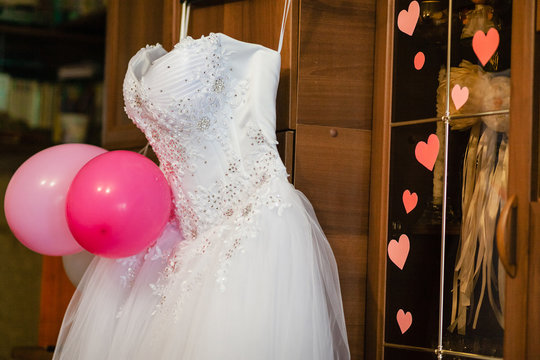 Image Of The Bodice Of A Weeding Dress On A Hanger