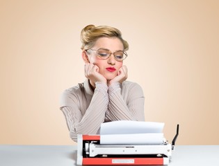 Journalist. Beautiful journalist looks typewriter