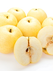 Asian pears sliced open in a group