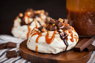 Caramel and chocolate Pavlova meringue cake