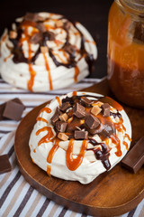 Caramel and chocolate Pavlova meringue cake