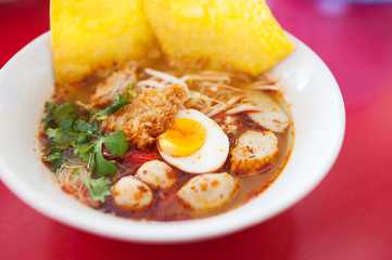 Pork noodle tom yum, condensed water egg