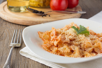 Farfalle with tomato sauce and cheese