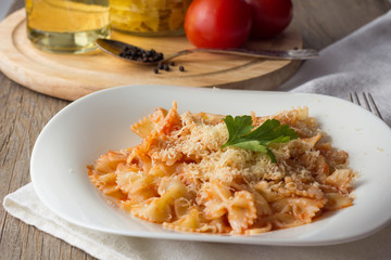 Farfalle with tomato sauce and cheese