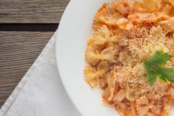 Farfalle with tomato sauce and cheese