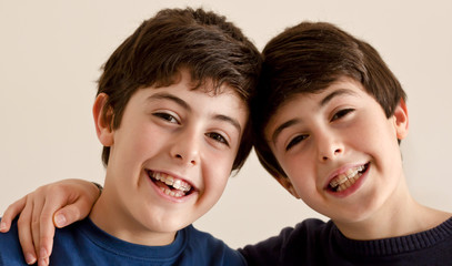 Happy teens  with braces © dogmer