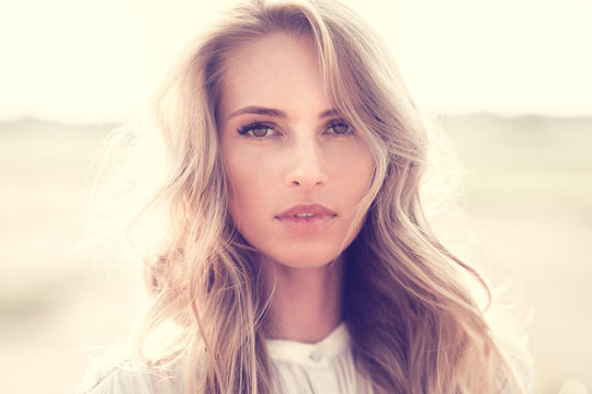 Fototapeta portrait of a beautiful young woman close up